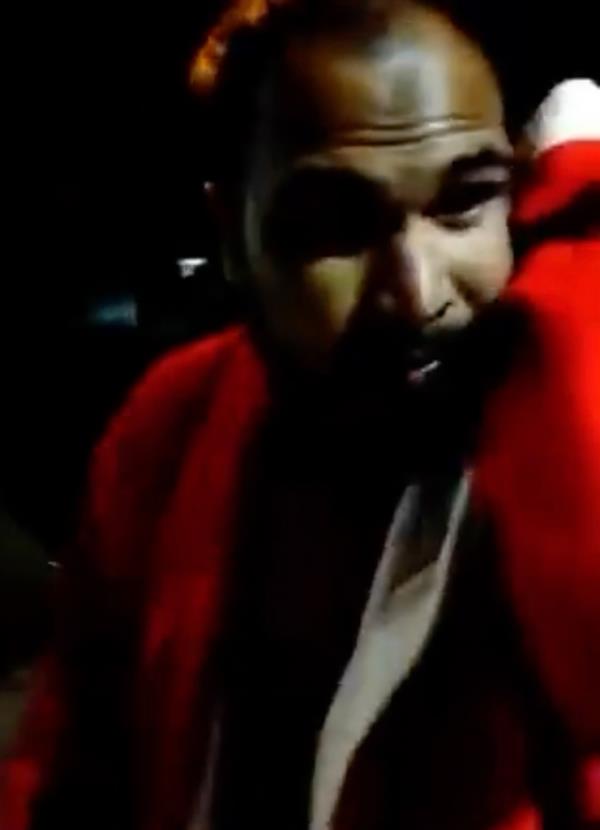 One of the men beat up whole dressed as Santa Claus.