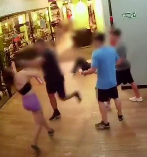 After a verbal altercation, the officer then throws a punch.